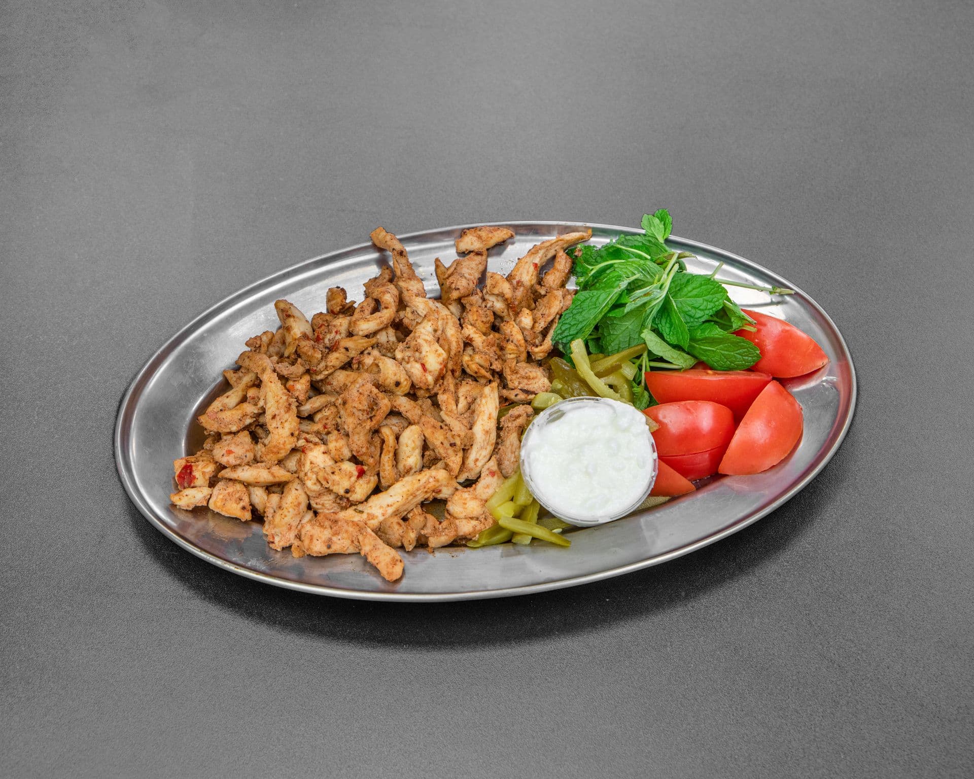 Chicken shawarma plate with garlic sauce