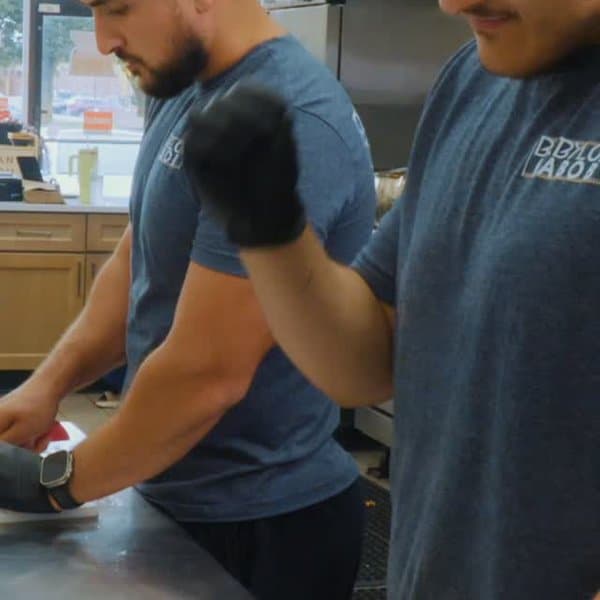 The Alshara brothers working in the kitchen
